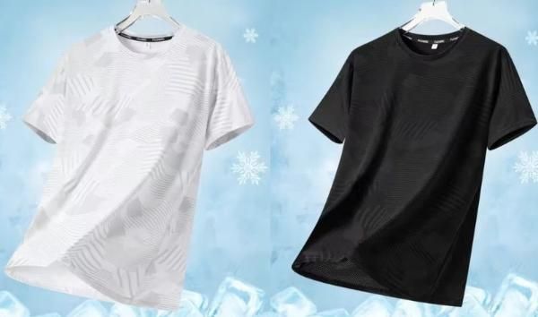 White and black t-shirts on hangers against a light blue background with snowflake patterns.