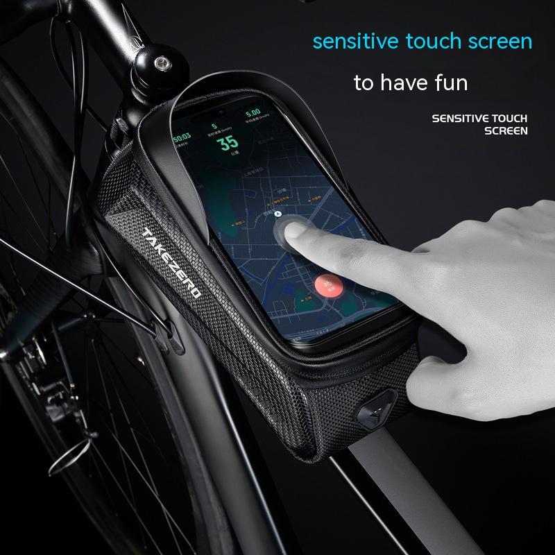 Bicycle phone mount with touchscreen interface on a bike frame, showing a hand interacting with the screen.