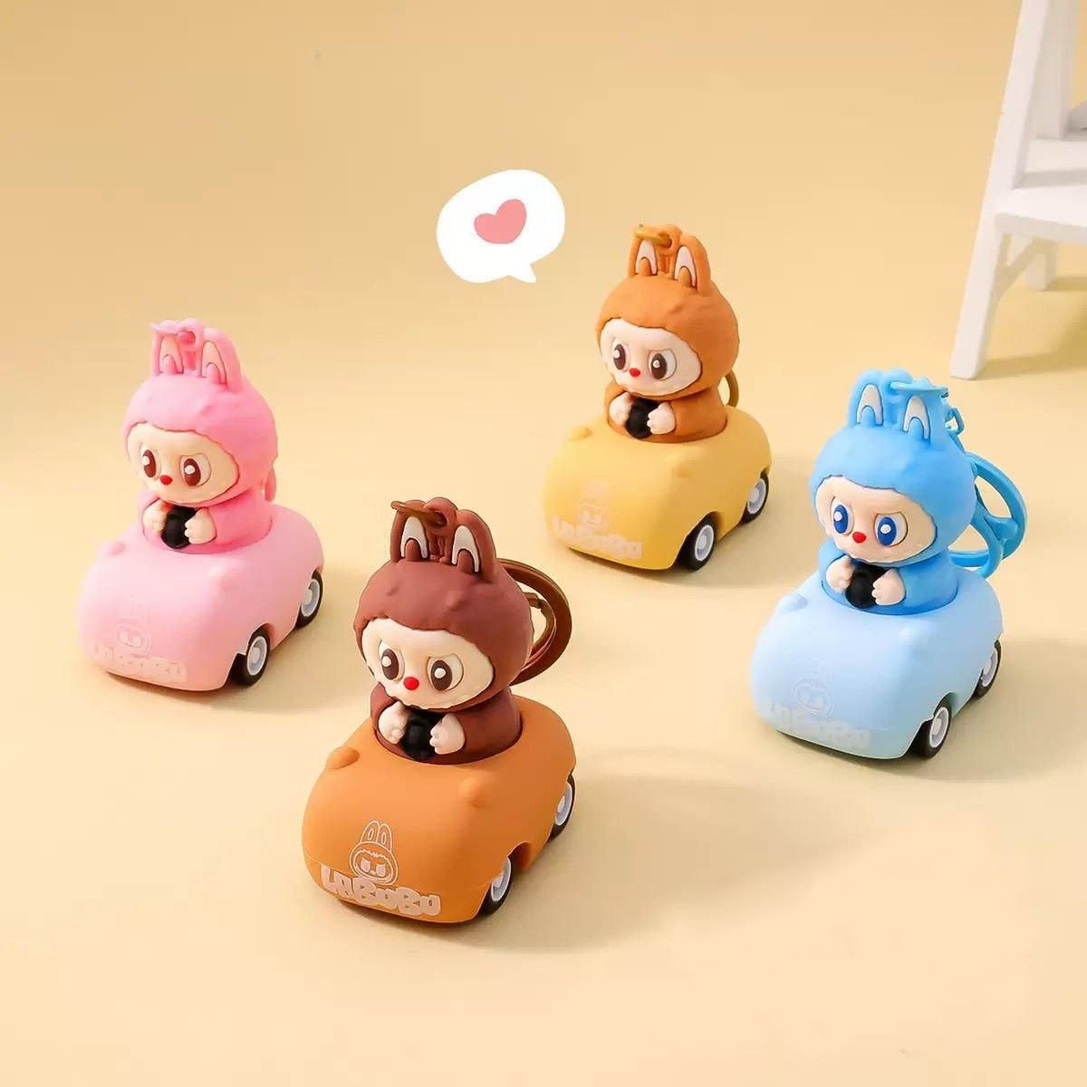 Four colorful toy cars with cartoon characters on a beige background