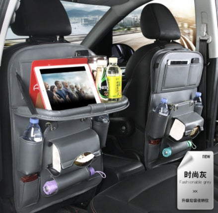 Car back seat organizer with tablet holder, drink holders, and storage pockets.
