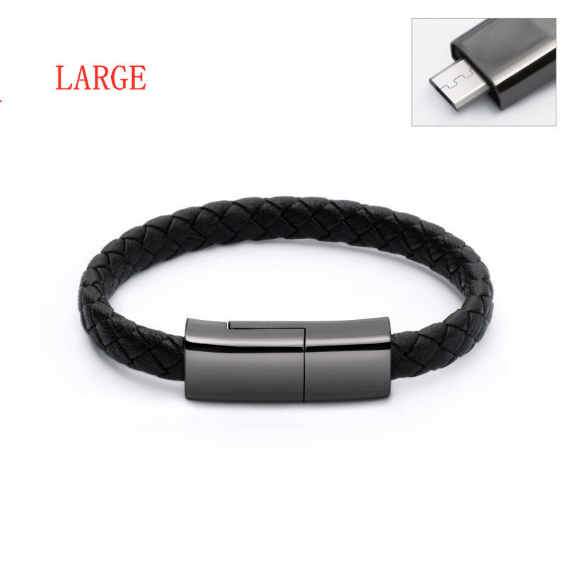 Black braided leather bracelet with metallic clasp on a white background