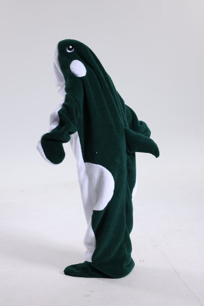 Green and white whale costume on a white background