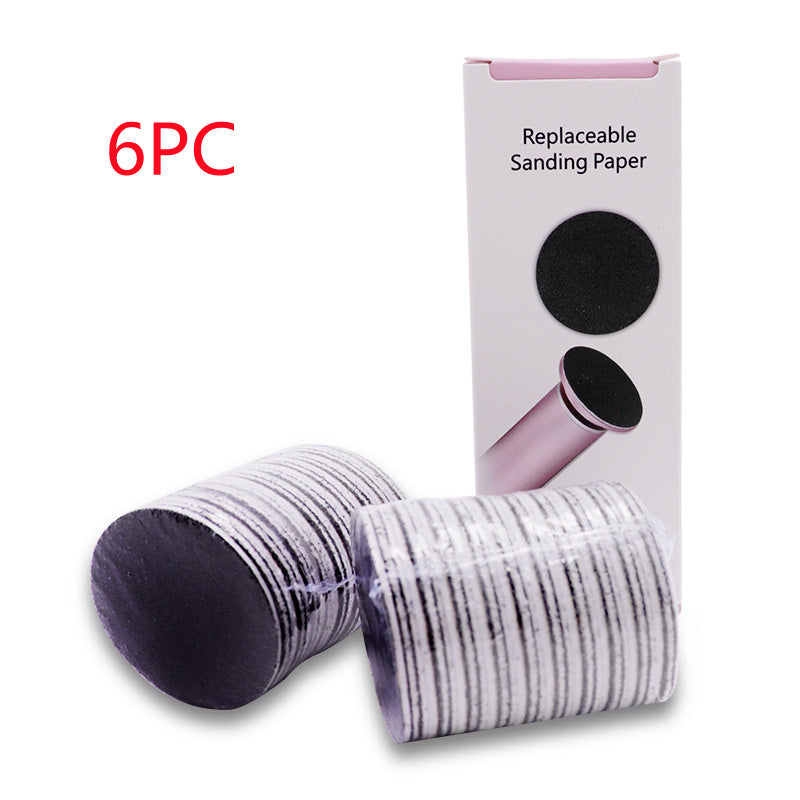 Electric foot callus remover device shown in pink color, alongside a visual depiction of its use on a foot, and a close-up of the device's head showing the replacement sandpaper.