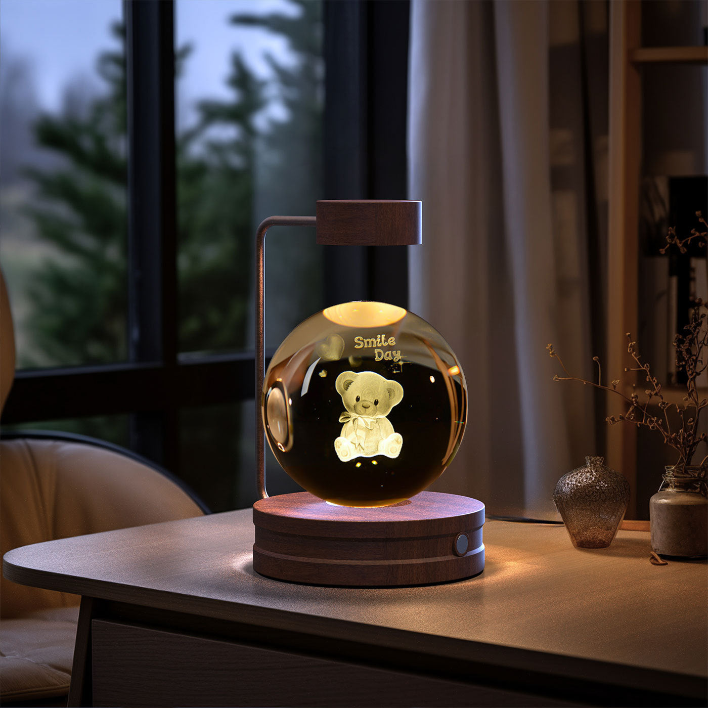 Glowing decorative lamp with a teddy bear inside on a table.