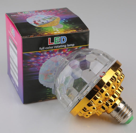 LED full color rotating lamp with packaging on a gray background