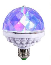 Colorful disco ball light on a white background