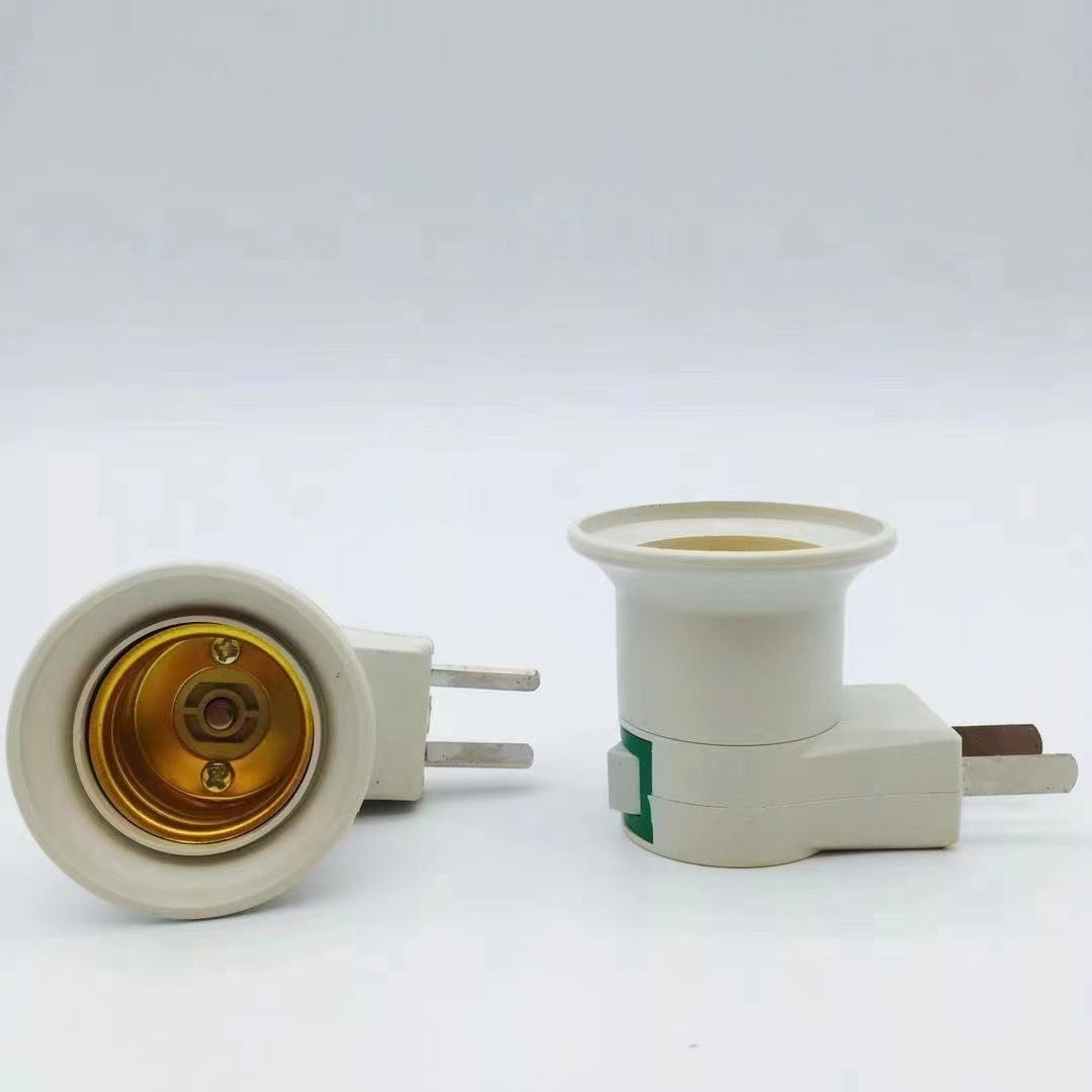 Two light bulb sockets on a white background
