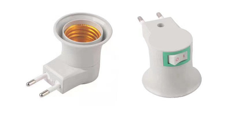 Two white electrical adapters on a white background