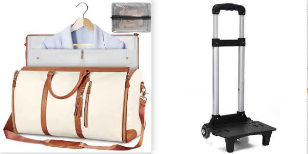 White duffel bag with brown leather straps, hanger with shirt, and black hand truck on white background