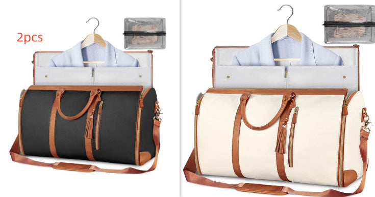 Two travel bags with hangers and clothes, one black and brown, one white and brown, on a white background.