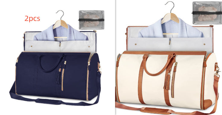 Two travel bags, one navy and one beige with brown handles, on hangers with shirts inside.