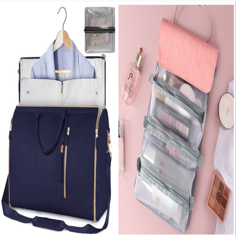 Navy blue travel bag with hanging compartment and pink pouch on a white background
