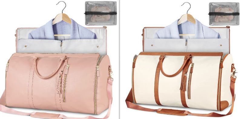 Two travel bags, one pink and one white with brown handles, on hangers with clothes inside.