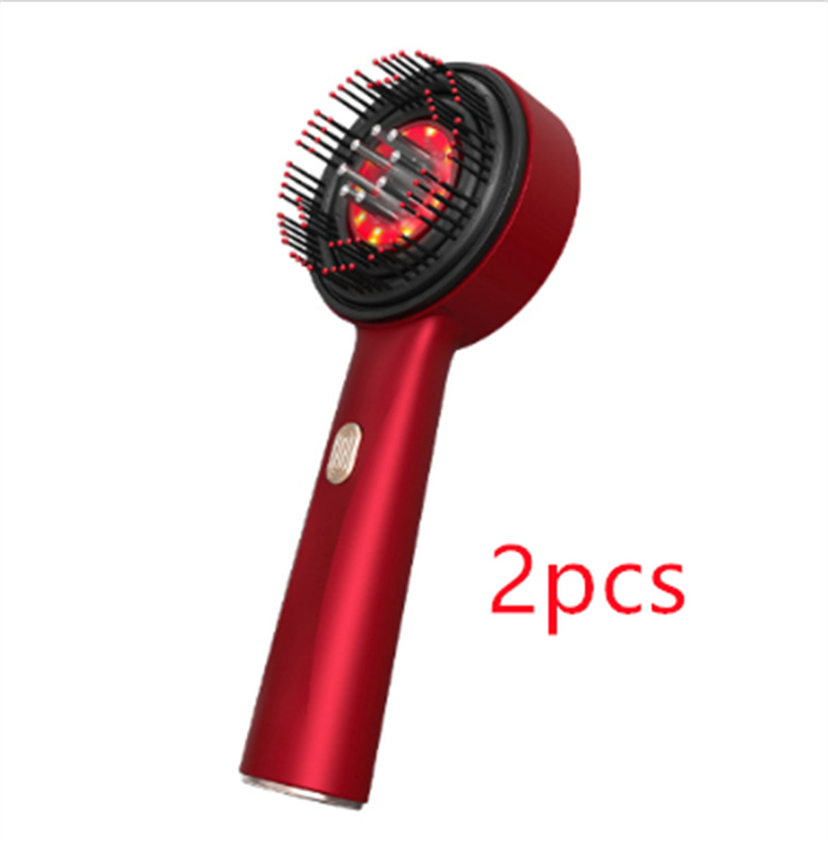 A person is holding a red electric massage comb with a black head, demonstrating its design and size.
