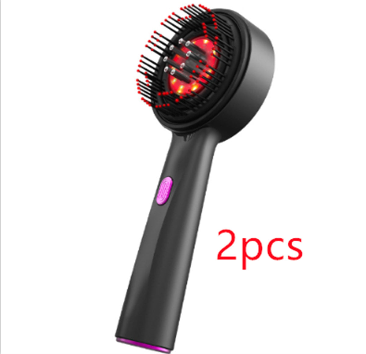 A person is holding a red electric massage comb with a black head, demonstrating its design and size.