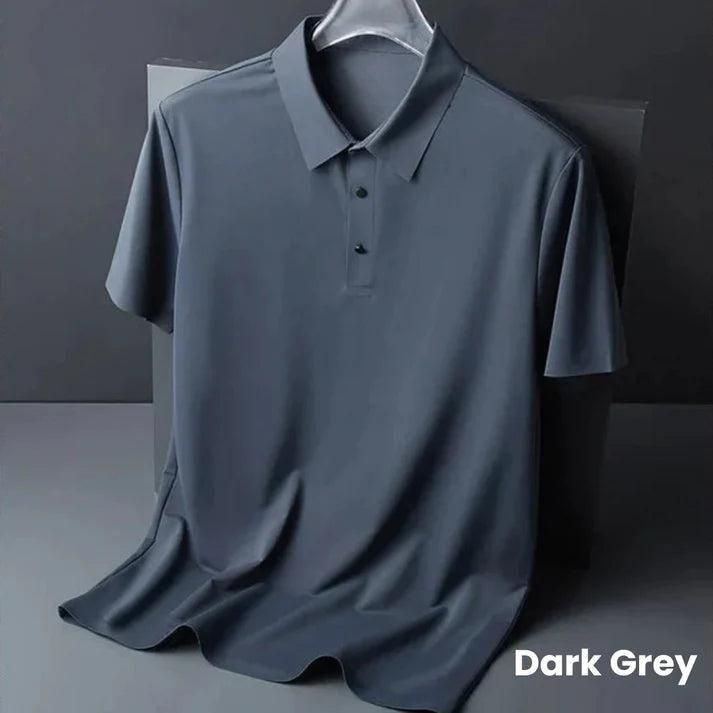 Dark grey polo shirt on a hanger against a dark background