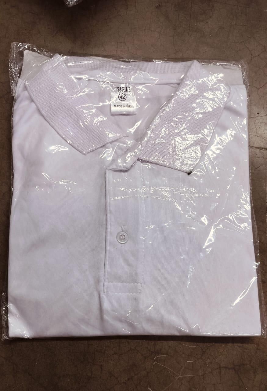 White shirt in clear plastic packaging on a brown surface