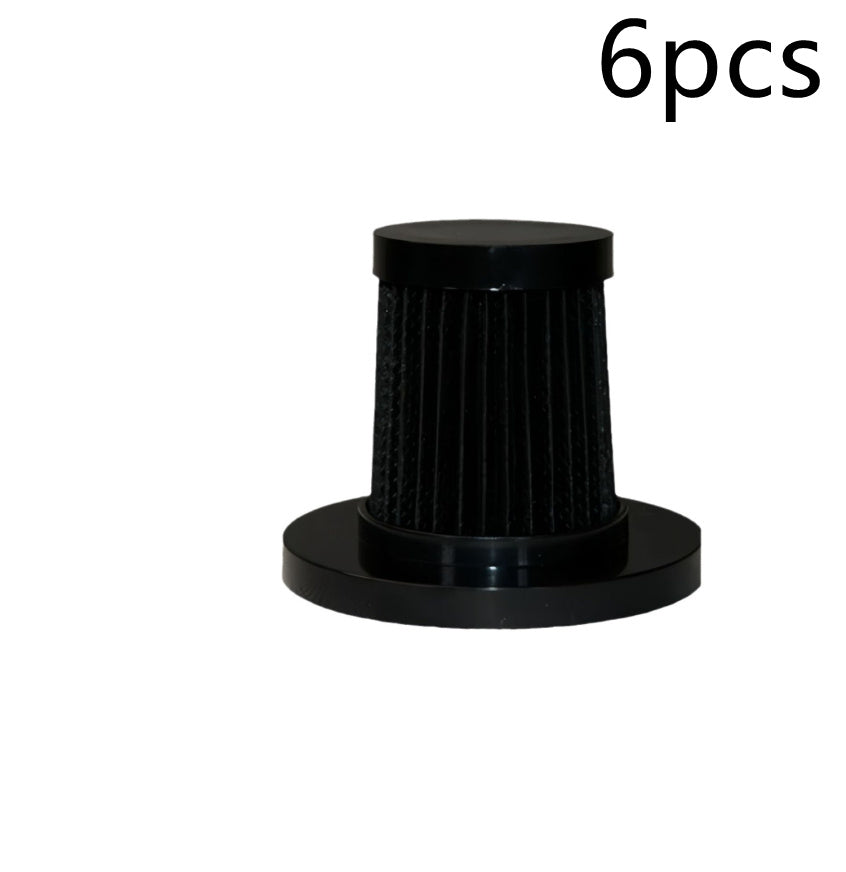 A handheld electric UV mite remover with a pink and gray color scheme being used on a fabric surface, showcasing its UV sterilization function.