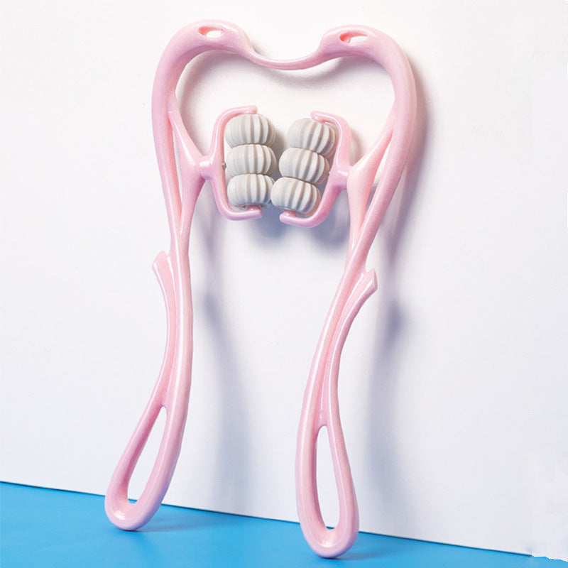 Pink facial roller with textured surface on a white background