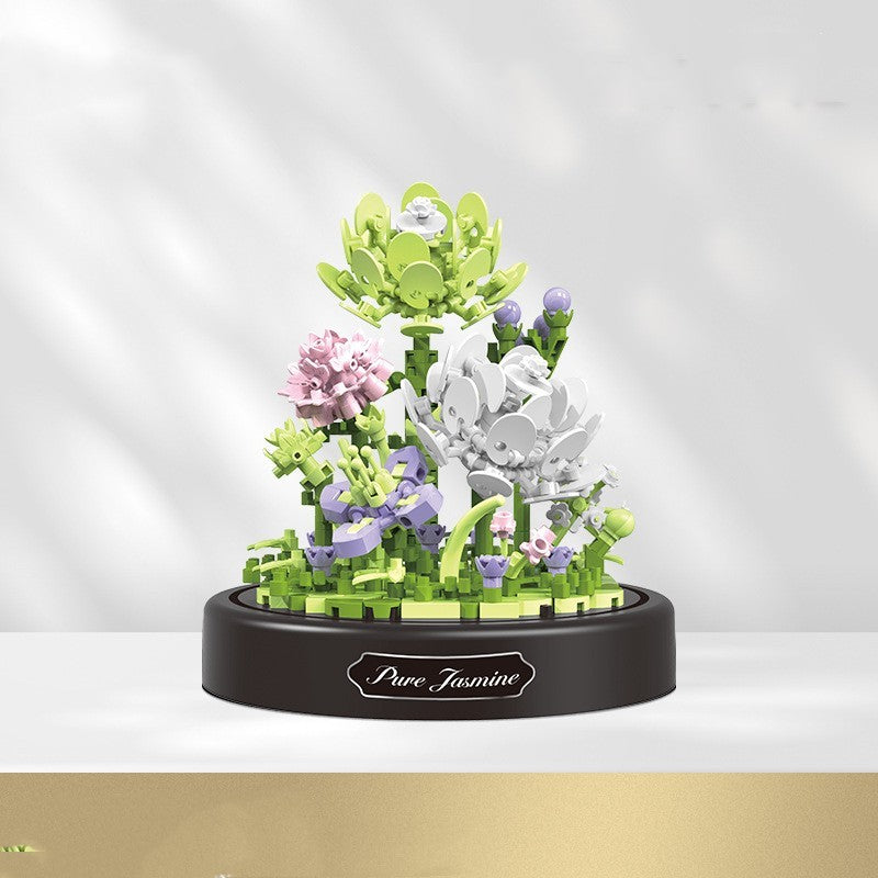 Decorative piece with flowers and a rabbit figure on a white background