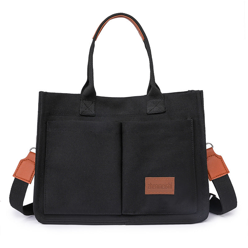 A collection of canvas tote shoulder bags in various colors, displayed in multiple pockets and with adjustable shoulder straps, showcased in a vertical format.