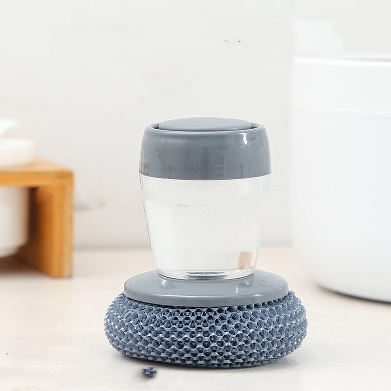 Glass tumbler with a textured gray base on a light surface