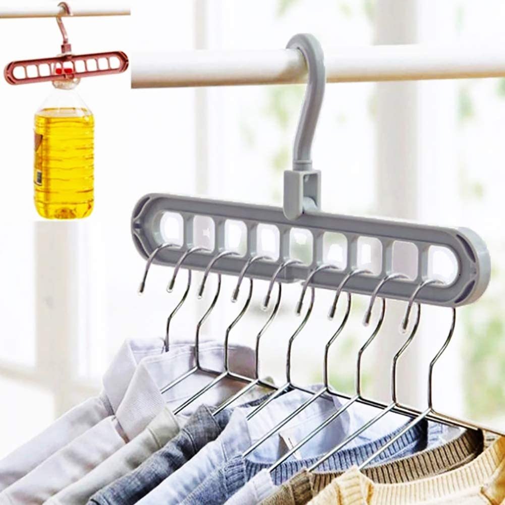Multi-functional hanger with clothes on a blurred background