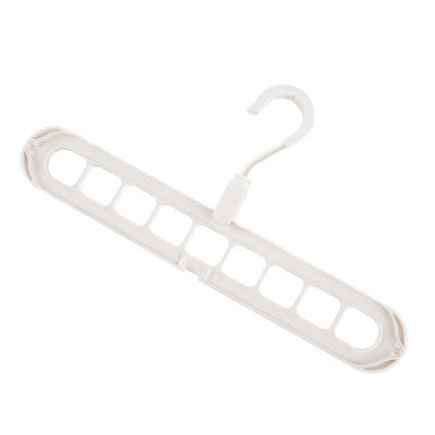 White plastic hanger on a white background