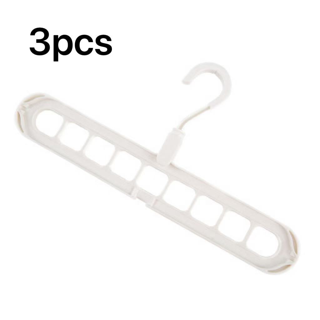 White plastic hanger with multiple hooks on a white background