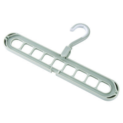 Gray plastic hanger with multiple hooks on a white background
