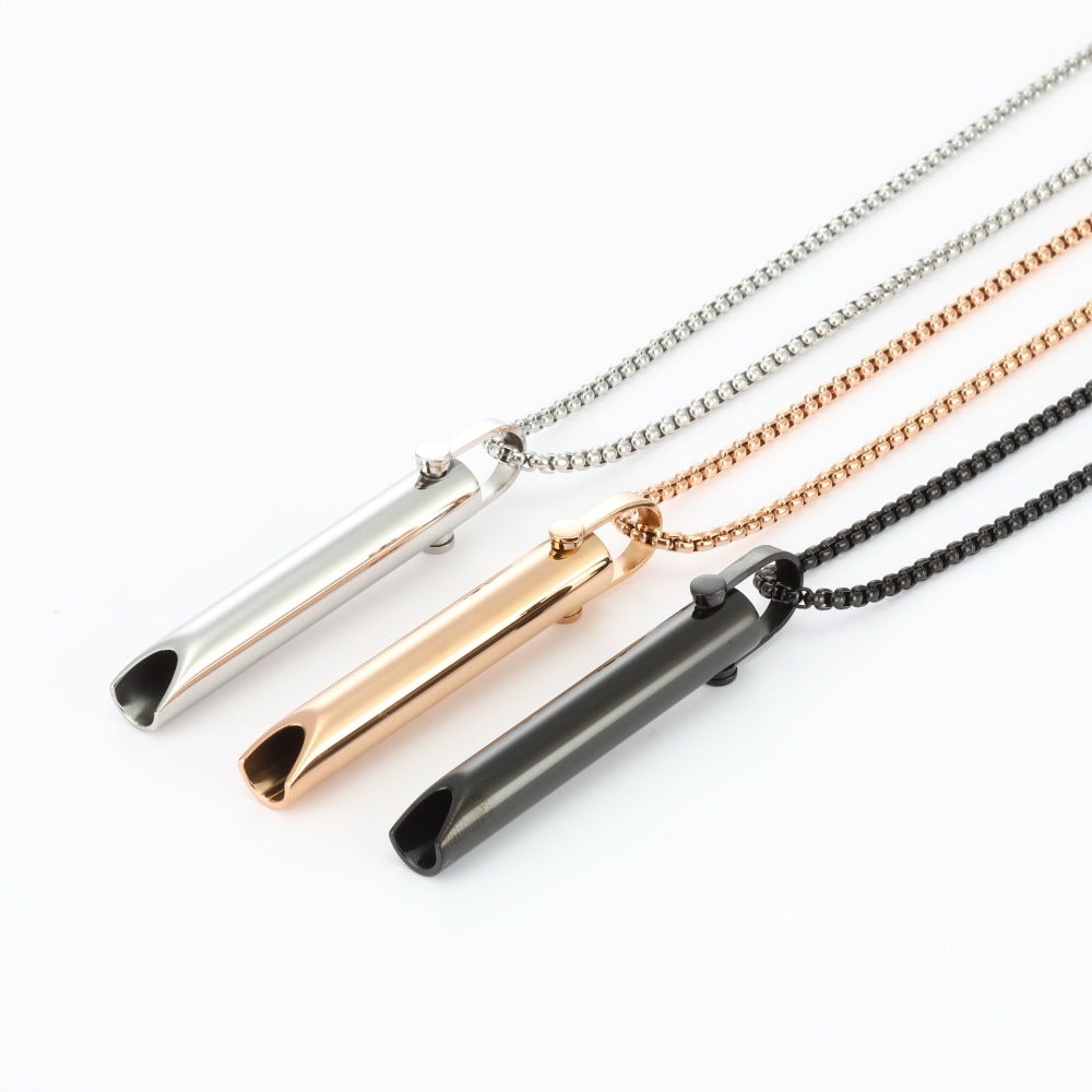Four necklaces with different colored pendants on a white background