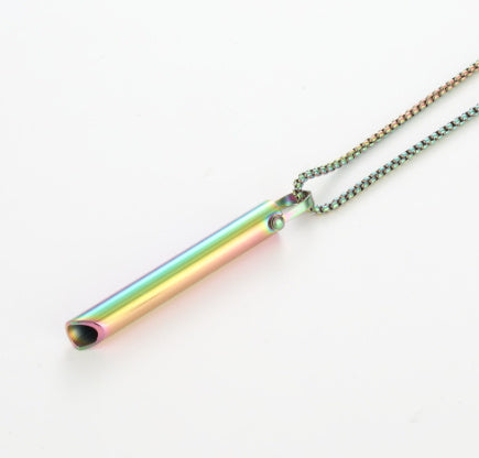 Neon-colored cylindrical pendant on a chain against a white background