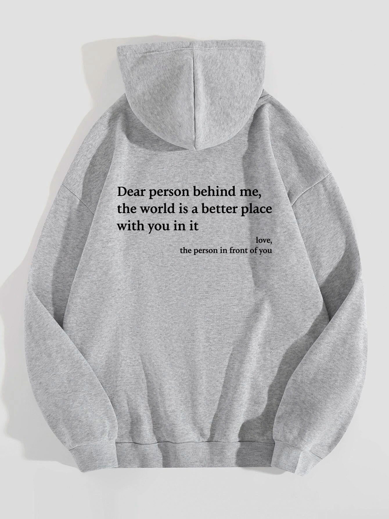 Gray hoodie with a printed message on a white background