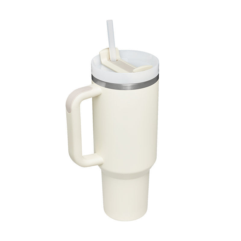 white tumbler with straw