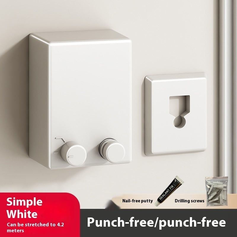 White light switch and socket on a neutral wall with text about punch-free installation.
