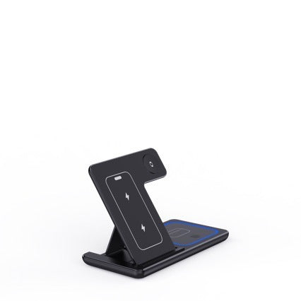 Black phone stand with charging pad on a white background
