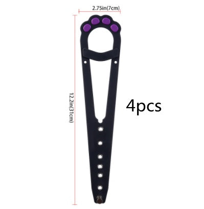 A pet cat door holder latch with a keyhole, shown in black with purple details, installed on a white door, with a cat looking at a dog through the door.