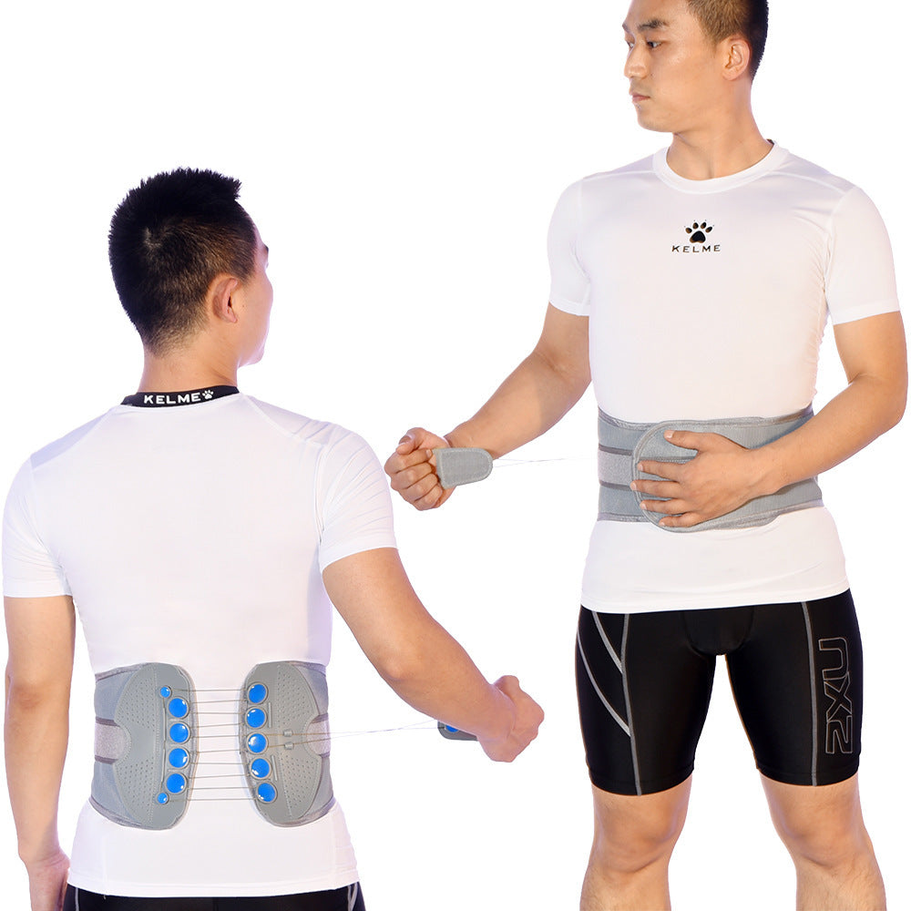 Person wearing a gray back brace with blue buttons on a white background