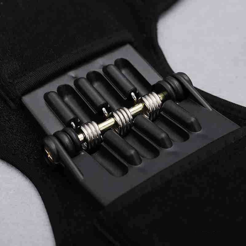 Close-up of a black and gold hair clip in a case